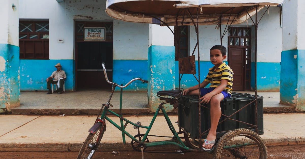 Cuba 'taxi colectivo' - availability and prices? - Little Boy Sitting on Cuban Rickshaw Taxi Cuba 'taxi colectivo' - availability and prices? - Little Boy Sitting on Cuban Rickshaw Taxi