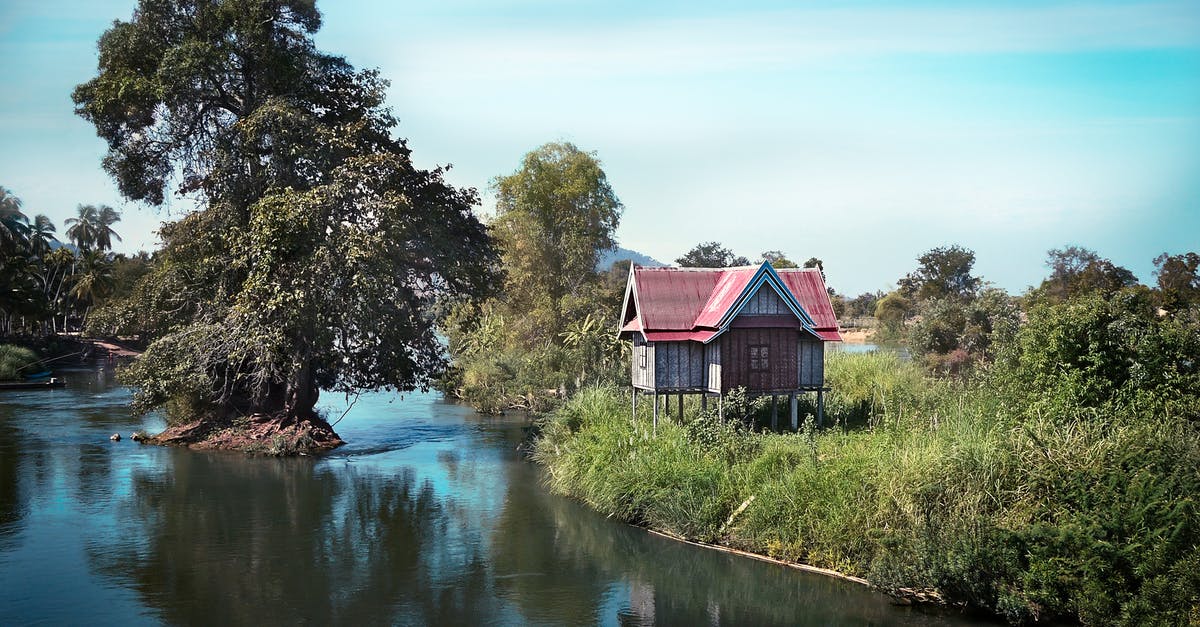 Currencies in Laos - House Near Lake Currencies in Laos - House Near Lake