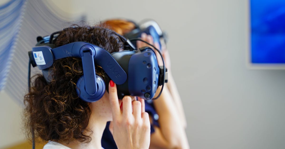 Dealing with nodding or shaking of head confusion - A Woman Wearing a Virtual Reality Headset Dealing with nodding or shaking of head confusion - A Woman Wearing a Virtual Reality Headset