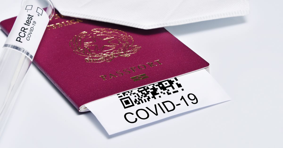 Declaring 'countries visited' at immigration after travelling with dual citizenship - COVID-19 and travel concept, mark of coronavirus PCR testing in tourist Italian passport.Diagnostics of coronavirus in airport due to lockdown. Business and tourism hit by corona virus during Declaring 'countries visited' at immigration after travelling with dual citizenship - COVID-19 and travel concept, mark of coronavirus PCR testing in tourist Italian passport.Diagnostics of coronavirus in airport due to lockdown. Business and tourism hit by corona virus during