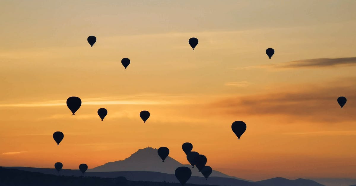 Denied entry at the Canadian land border; will I be denied if I fly? - Bunch of air balloons at sunset Denied entry at the Canadian land border; will I be denied if I fly? - Bunch of air balloons at sunset