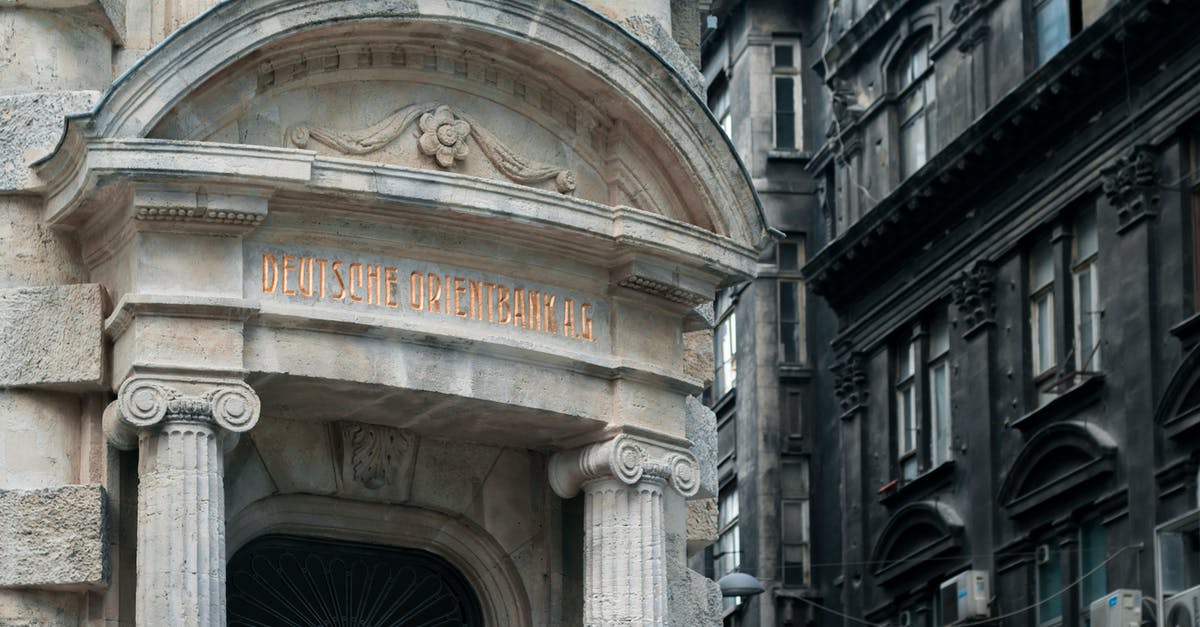 Deutsche Bahn not responding? - Bank in classic building on street Deutsche Bahn not responding? - Bank in classic building on street
