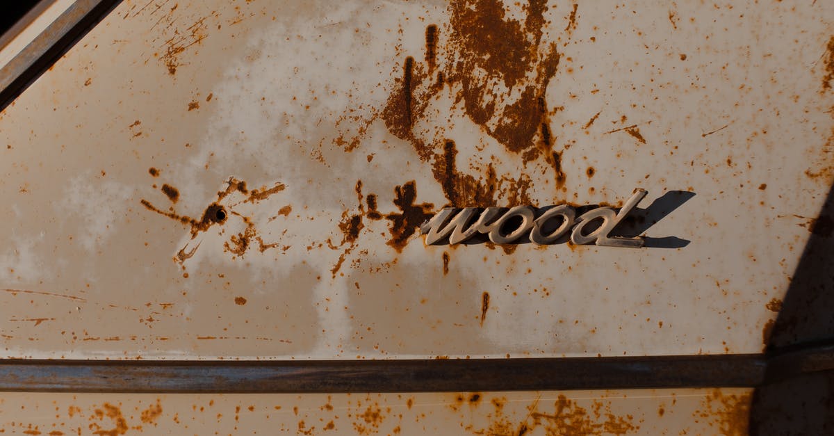 DHL damaged luggage, requests exact spare part price, but I can't find spare parts for the brand. What can I do? - Corroded stains on part of old automobile with fragment of brand name written by metal letters DHL damaged luggage, requests exact spare part price, but I can't find spare parts for the brand. What can I do? - Corroded stains on part of old automobile with fragment of brand name written by metal letters