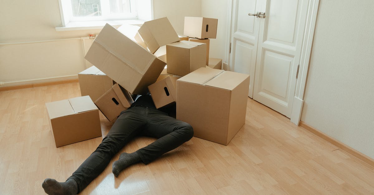 Did anyone try the Under-The-Jack Pack backpack? - Person in Black Pants Lying on Brown Cardboard Boxes Did anyone try the Under-The-Jack Pack backpack? - Person in Black Pants Lying on Brown Cardboard Boxes