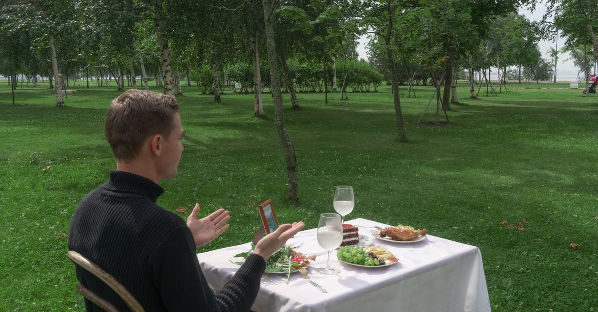 Did I miss something? - Man sitting at table served for two in park Did I miss something? - Man sitting at table served for two in park
