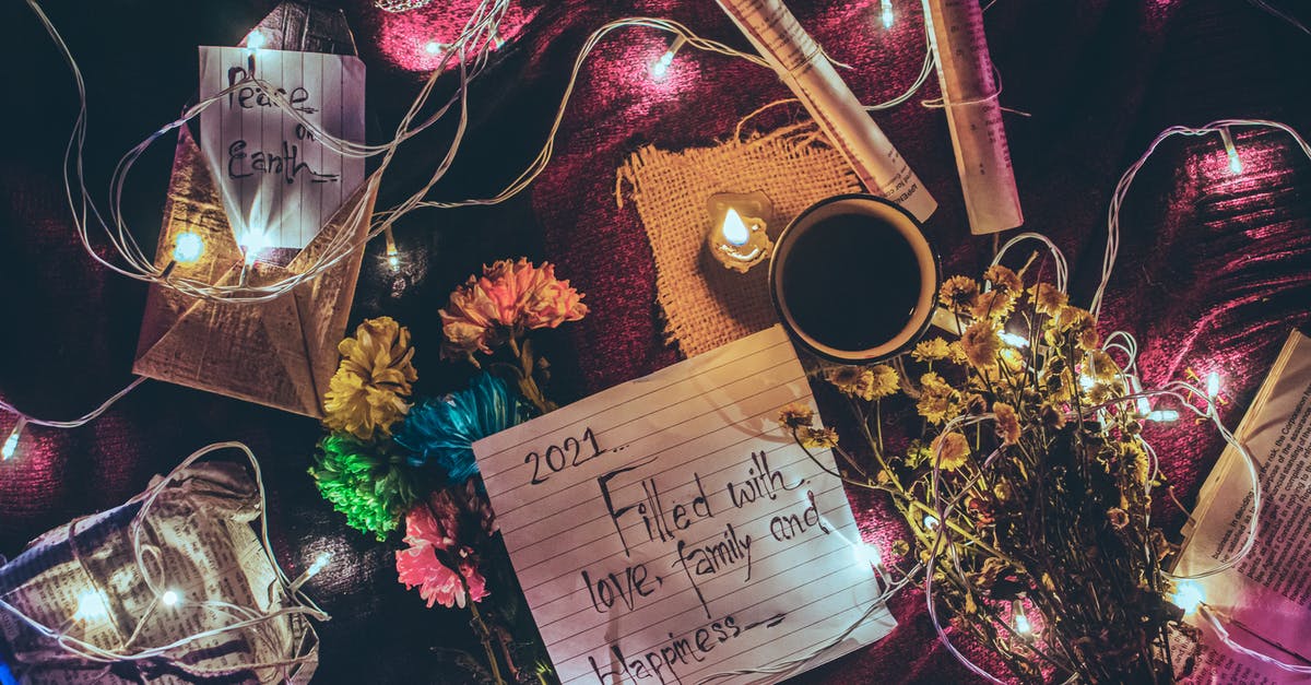Difference between 'as you wish dining' vs 'second seating' - From above of various Christmas decorations and glowing garland placed on table with paper sheets with different written wishes and cup of coffee Difference between 'as you wish dining' vs 'second seating' - From above of various Christmas decorations and glowing garland placed on table with paper sheets with different written wishes and cup of coffee