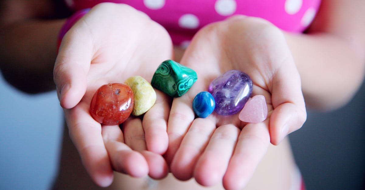 Differences between the Routes of the Camino de Santiago - Woman Holding Six Polished Stones Differences between the Routes of the Camino de Santiago - Woman Holding Six Polished Stones