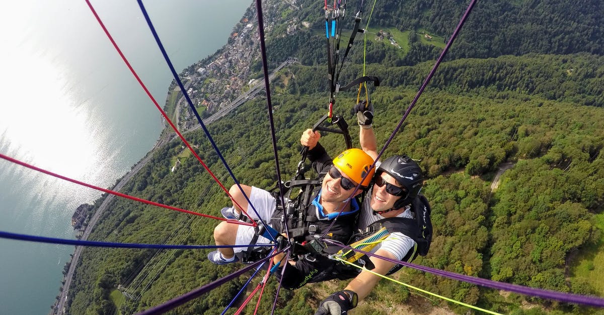 Different baggage allowance on two legs of a flight (TAP/LOT) - People Riding Cable Cars over Green Mountain Different baggage allowance on two legs of a flight (TAP/LOT) - People Riding Cable Cars over Green Mountain