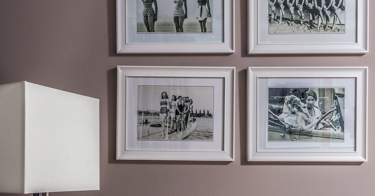 Different Details on Previous Passport - Collection of framed photos on wall Different Details on Previous Passport - Collection of framed photos on wall