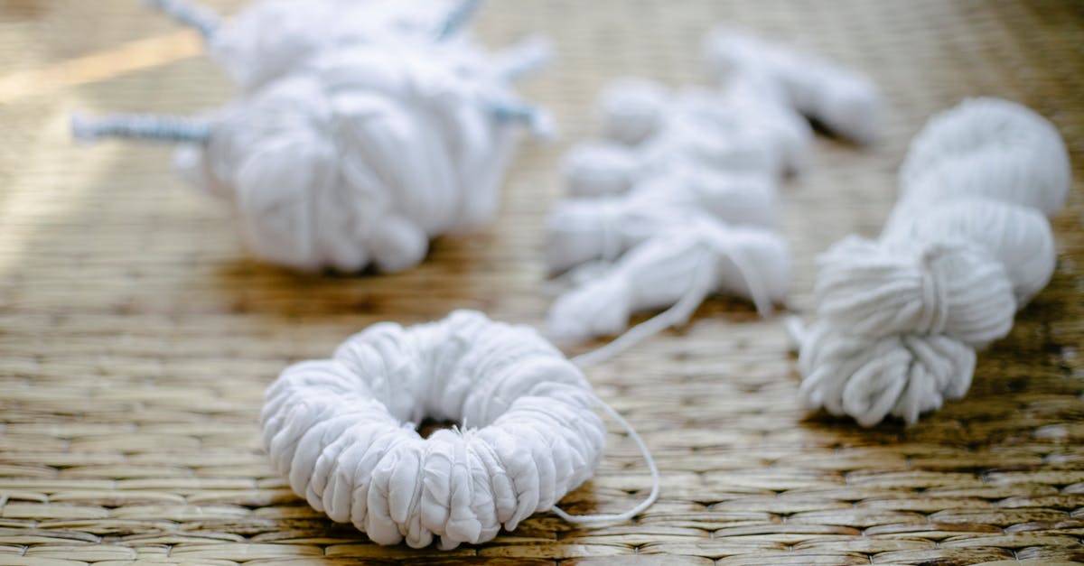 Different name in my Philippine and Japanese Passport - Tied fabrics scattered on rattan surface before creating shibori pattern Different name in my Philippine and Japanese Passport - Tied fabrics scattered on rattan surface before creating shibori pattern