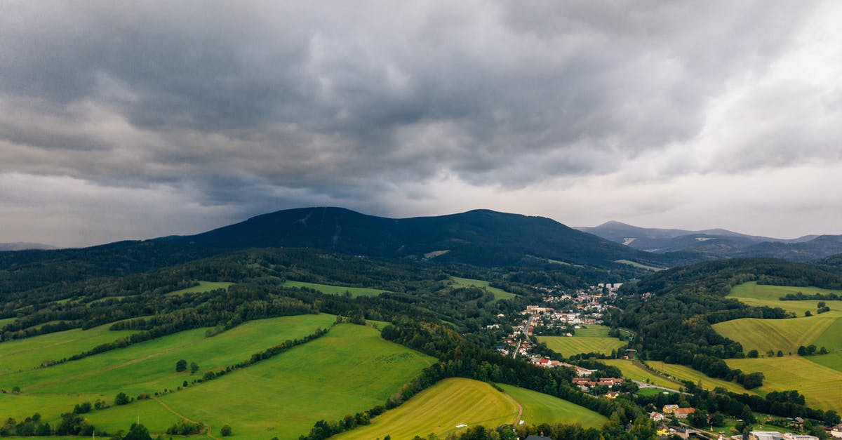 Difficulties during trip from Poland to Russia via Belarus - Aerial Photo of A Town And Its Surrounding Landscape Under Cloudy Sky Difficulties during trip from Poland to Russia via Belarus - Aerial Photo of A Town And Its Surrounding Landscape Under Cloudy Sky