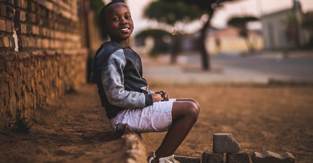 Do children stay free in hotels/accommodation in South Africa? - Boy Sitting on Dirt Do children stay free in hotels/accommodation in South Africa? - Boy Sitting on Dirt