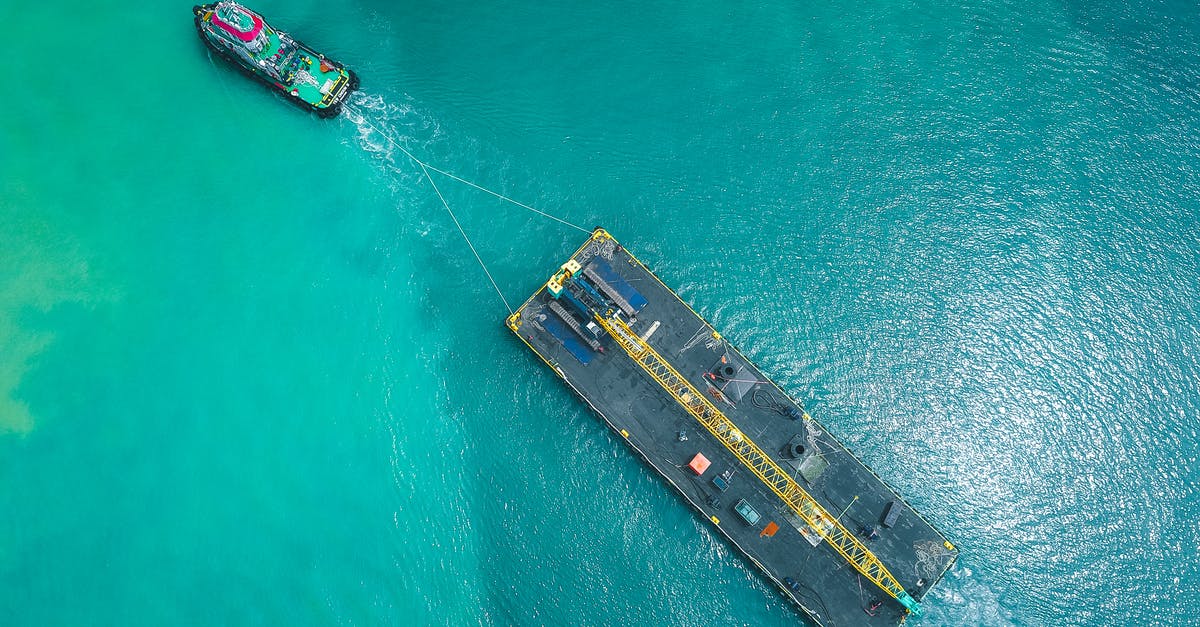 Do cruise passengers answer In Transit on the ESTA application? - Aerial view of motorboat transporting platform on seawater Do cruise passengers answer In Transit on the ESTA application? - Aerial view of motorboat transporting platform on seawater