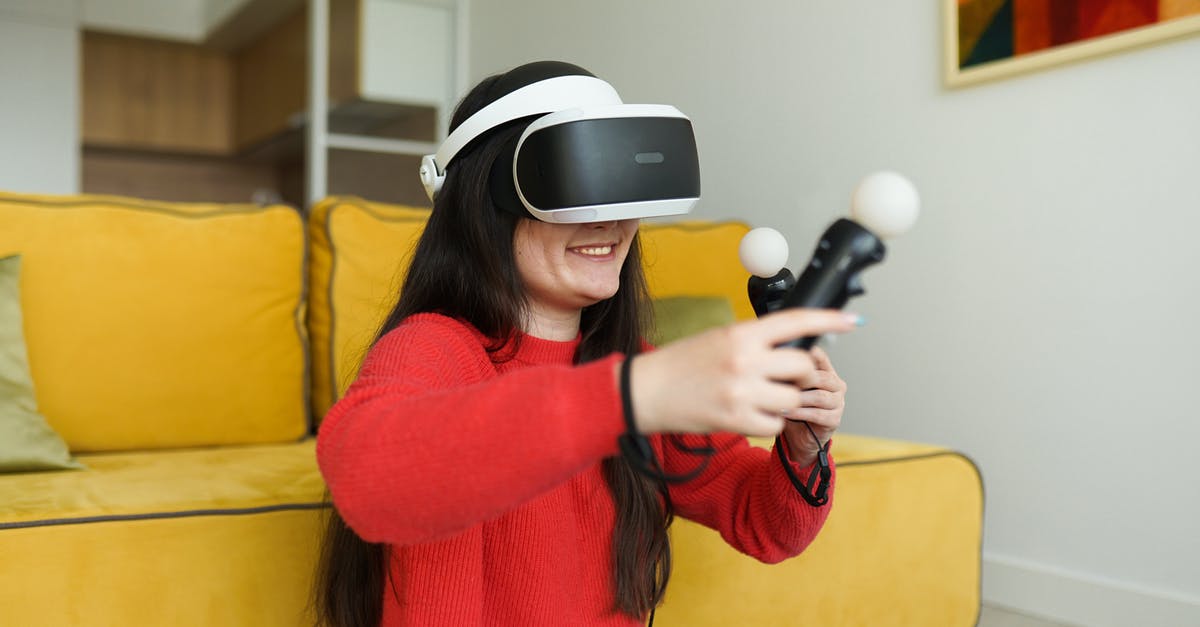 Do electronics bought airside have to be fully charged? - A Woman Playing Virtual Reality Do electronics bought airside have to be fully charged? - A Woman Playing Virtual Reality