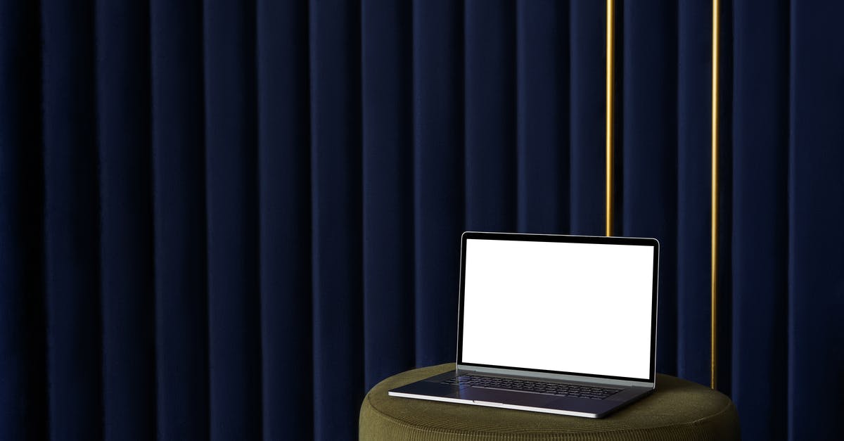 Do I have to declare my new laptop when leaving? - Laptop placed on pouf near curtain Do I have to declare my new laptop when leaving? - Laptop placed on pouf near curtain