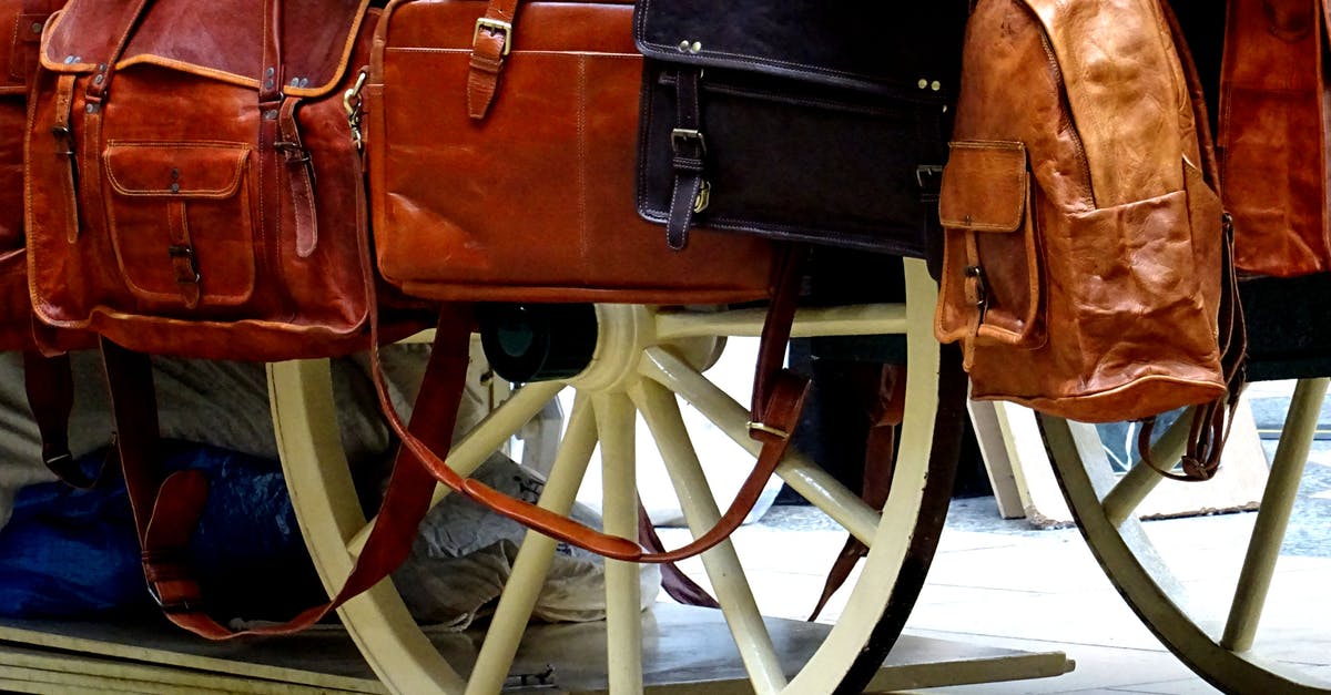 Do I have to handle my bags when transiting in Istanbul? - Two Brown and Black Leather Handbags Do I have to handle my bags when transiting in Istanbul? - Two Brown and Black Leather Handbags
