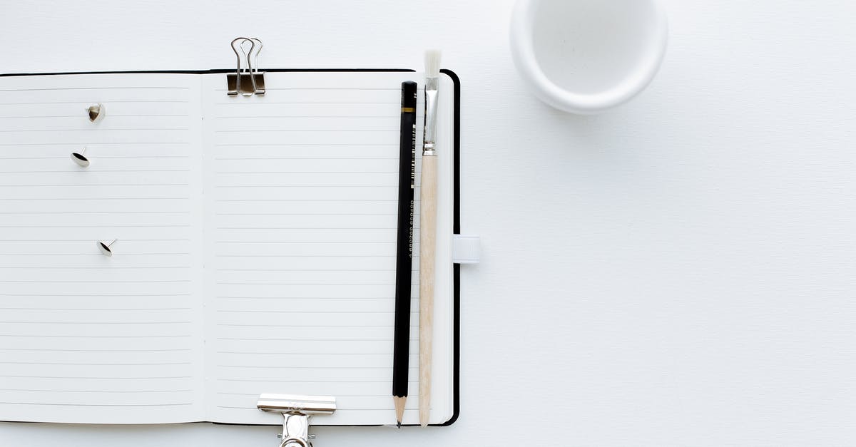Do I have to list all of the previous employment information in the DS-160 visa form? - Top view composition of opened diary with blank pages placed on white desk with pencil and paintbrush pins