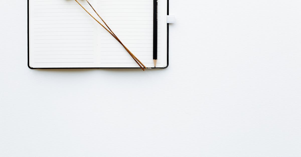 Do I have to list all of the previous employment information in the DS-160 visa form? - Top view composition of pencil and creative bookmarks placed on opened diary with blank sheets on white desk