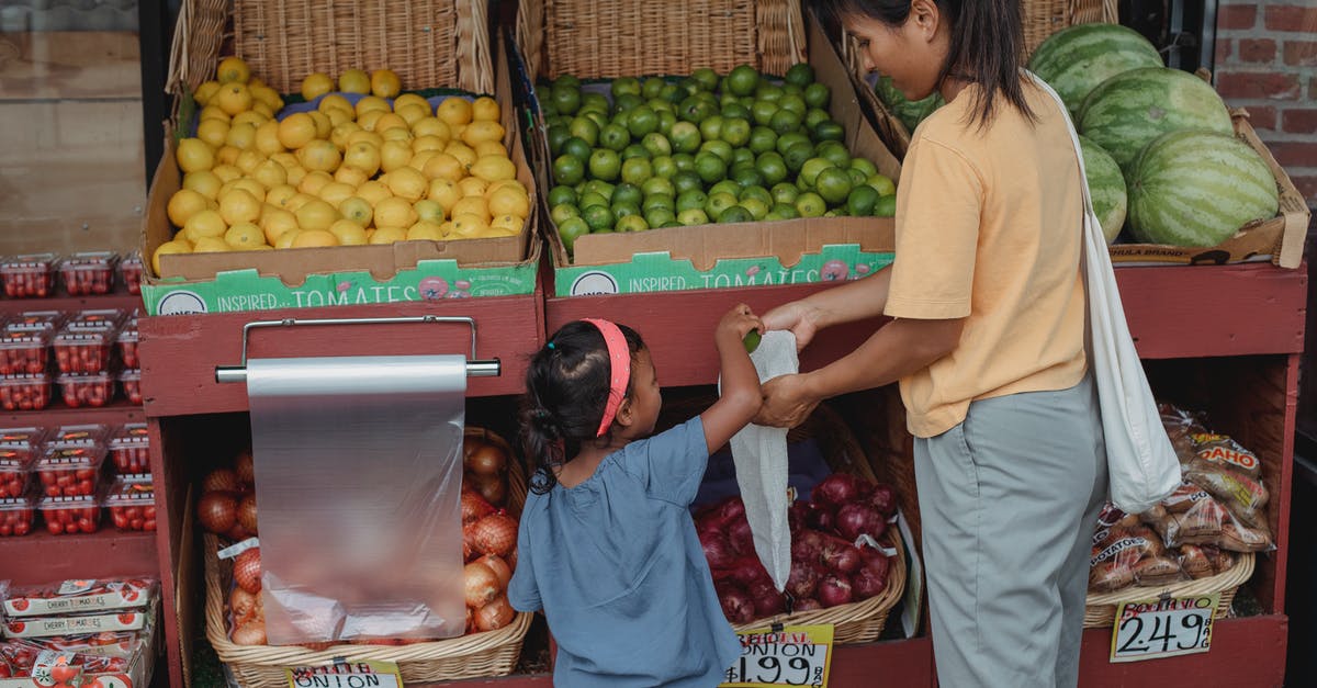 Do I have to pick up my luggage at Seoul Incheon and how many bags am I able to check? - Back view of Asian girl picking ripe limes from box to eco friendly bag while shopping with mother in market Do I have to pick up my luggage at Seoul Incheon and how many bags am I able to check? - Back view of Asian girl picking ripe limes from box to eco friendly bag while shopping with mother in market