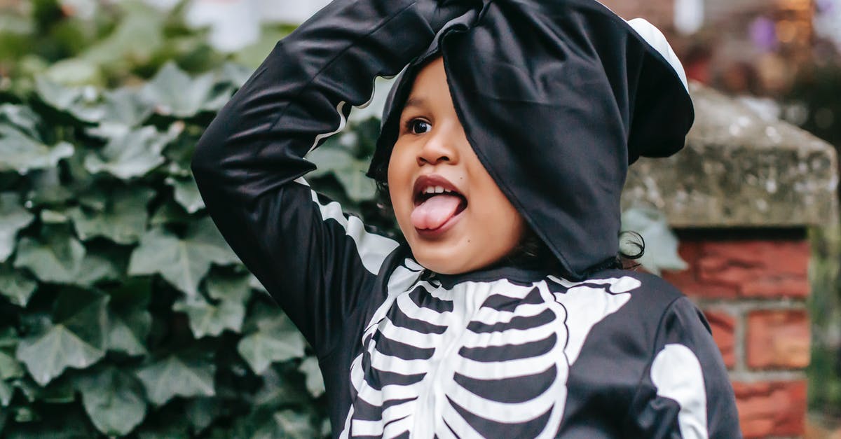 Do I have to stay out of Schengen for 90 or 180 days? [duplicate] - Ethnic child in skeleton costume with mask trick or treating for Halloween and grimacing on street near green bushes in day