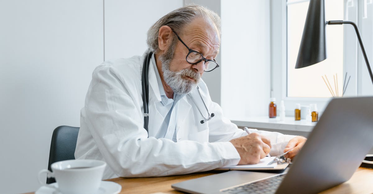 Do I need a doctor's note for bringing medication on an airplane? - An Elderly Doctor Writing Prescription Do I need a doctor's note for bringing medication on an airplane? - An Elderly Doctor Writing Prescription