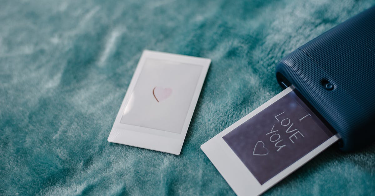 Do I need a schengen transit visa if I am transitting in 2 different Schengen countries? - Modern instant camera printing photo with heart symbol Do I need a schengen transit visa if I am transitting in 2 different Schengen countries? - Modern instant camera printing photo with heart symbol