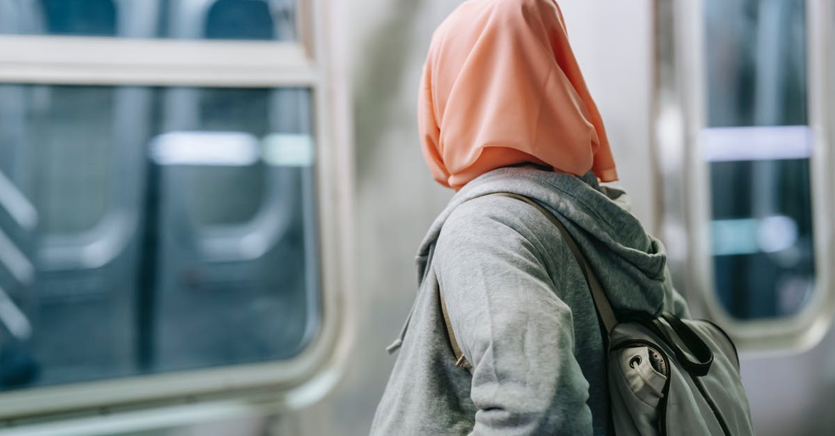 Do I need a transit visa to fly alone through Dublin (Ireland) to Philippines and back? - Unrecognizable woman in hijab standing in subway near train Do I need a transit visa to fly alone through Dublin (Ireland) to Philippines and back? - Unrecognizable woman in hijab standing in subway near train