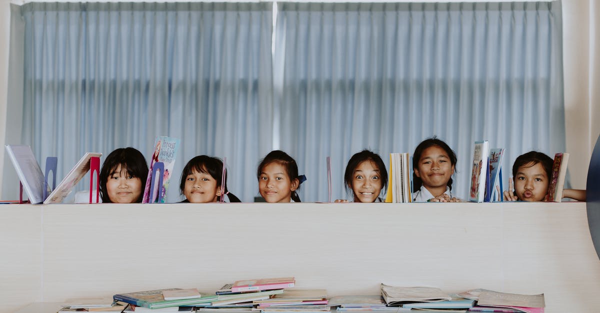 Do I need a visa to connect in Thailand on separately book tickets? - Portrait of Girls Behind Bookshelf in Classroom Do I need a visa to connect in Thailand on separately book tickets? - Portrait of Girls Behind Bookshelf in Classroom
