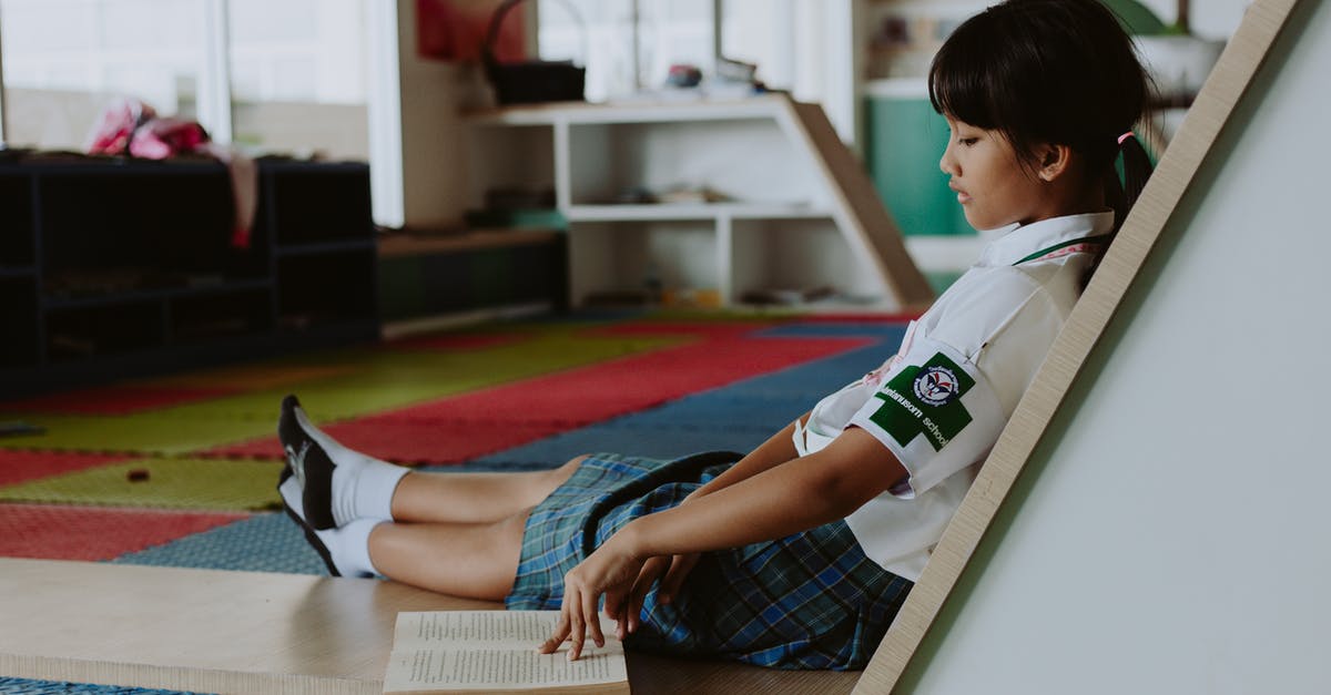 Do I need a visa to connect in Thailand on separately book tickets? - Girl in School Uniform Reading Book on Floor in Classroom Do I need a visa to connect in Thailand on separately book tickets? - Girl in School Uniform Reading Book on Floor in Classroom