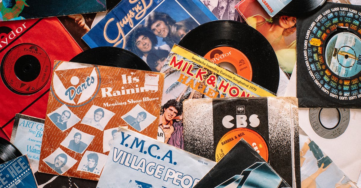 Do I need a visa to perform as an entertainer in the UK? - Set of retro vinyl records on table Do I need a visa to perform as an entertainer in the UK? - Set of retro vinyl records on table