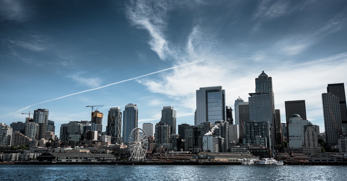 Do I need a visa to travel to Victoria from Seattle by ferry? - Photo of White Ferris Wheel Across City Buildings Do I need a visa to travel to Victoria from Seattle by ferry? - Photo of White Ferris Wheel Across City Buildings