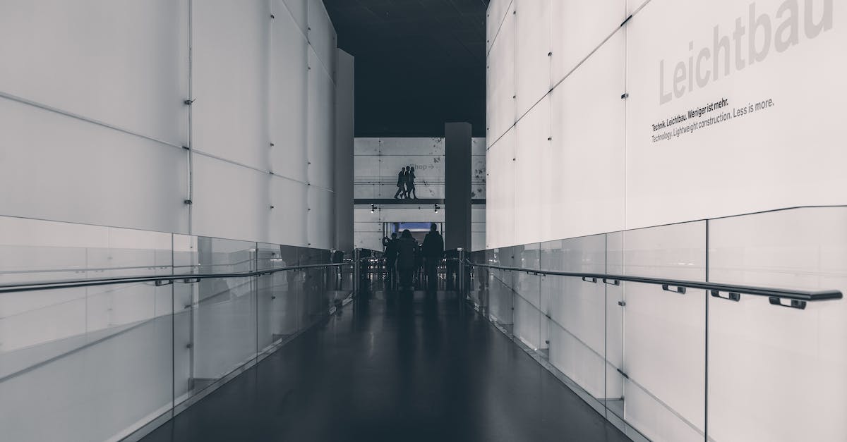 Do I need an airport transit visa for Germany if I have a Schengen visa? - Grayscale Photography Of A German Company Do I need an airport transit visa for Germany if I have a Schengen visa? - Grayscale Photography Of A German Company