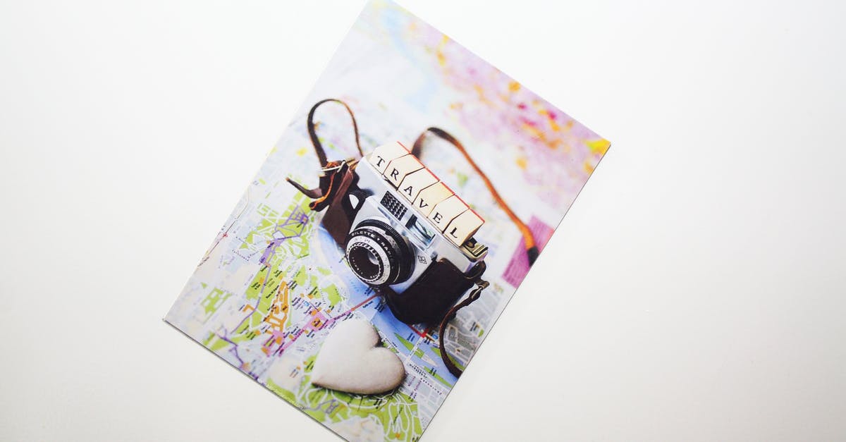 Do I need an EHIC card if I have travel insurance? - Silver Camera Photograph Placed on Surface Do I need an EHIC card if I have travel insurance? - Silver Camera Photograph Placed on Surface