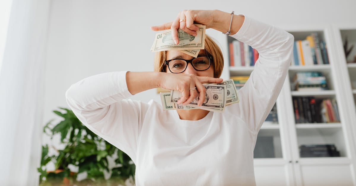 Do I need cash CHF for a weekend in Zurich? - Woman Holding Cash Do I need cash CHF for a weekend in Zurich? - Woman Holding CashÂ