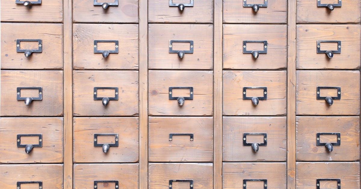 Do I need repeat biometrics when reapplying for a B1 visa? - Background of wall full of many similar aged shabby vintage wooden drawers with metal round handles Do I need repeat biometrics when reapplying for a B1 visa? - Background of wall full of many similar aged shabby vintage wooden drawers with metal round handles