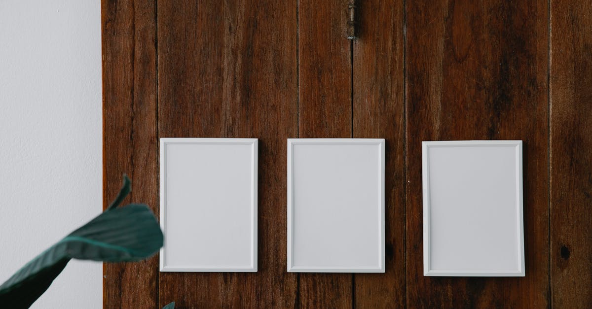 Do I need return flight proof in order to board from Madrid to Montevideo with Iberia? - Empty white photo frames on wooden surface Do I need return flight proof in order to board from Madrid to Montevideo with Iberia? - Empty white photo frames on wooden surface