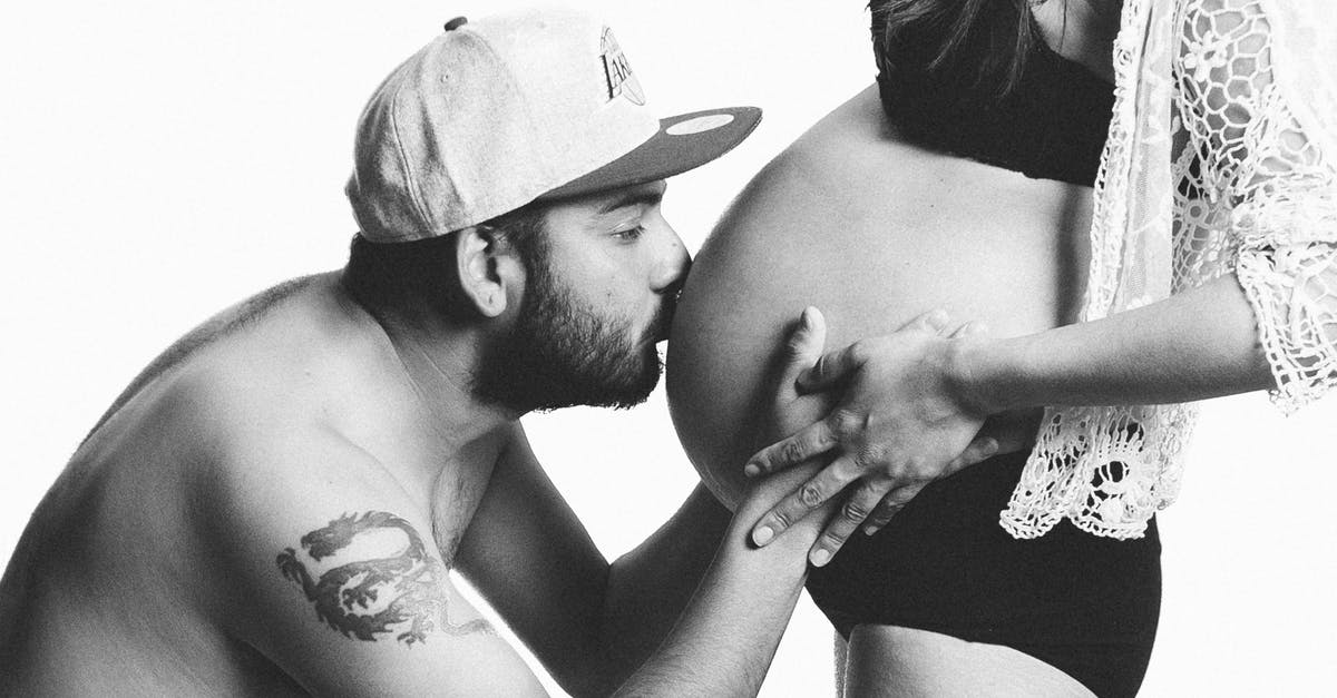 Do I need the original of my parents Birth Certificate to apply for an Australian passport - Grayscale Photography of Man Kissing Woman's Pregnant Bell