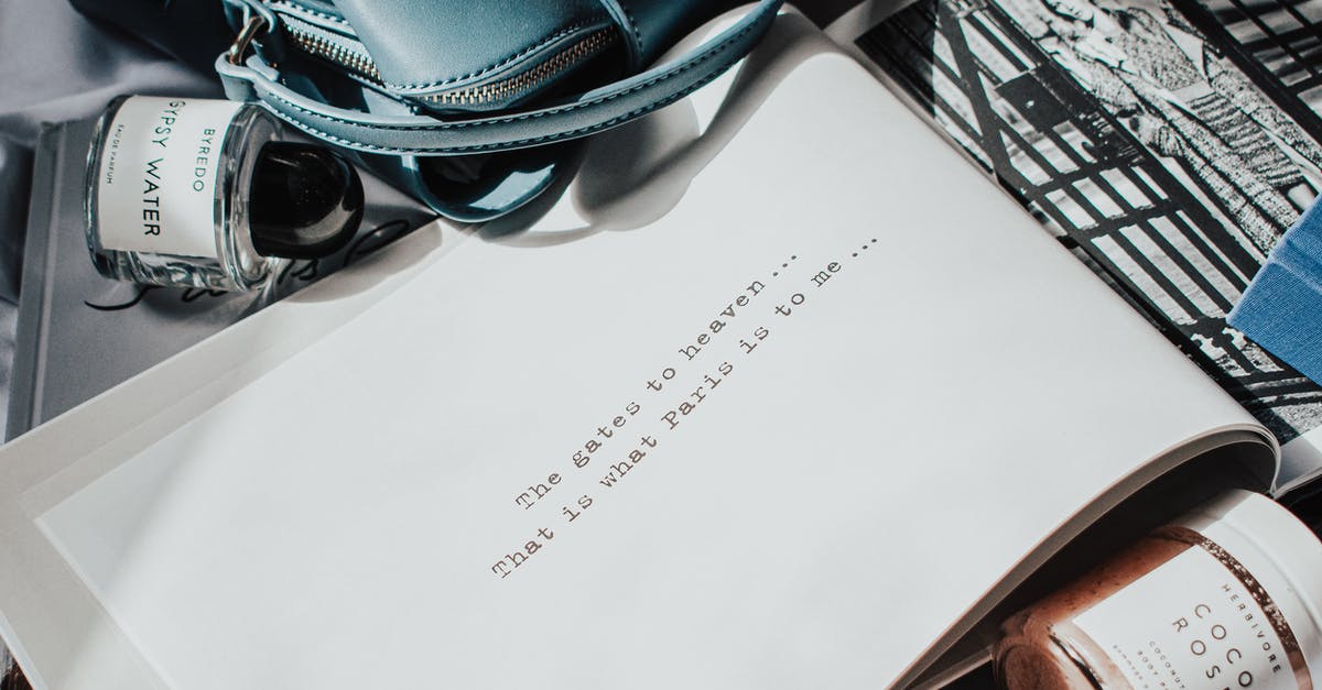 Do I need to book a taxi before arriving at Paris La Défense? - White Printer Paper on White Computer Keyboard