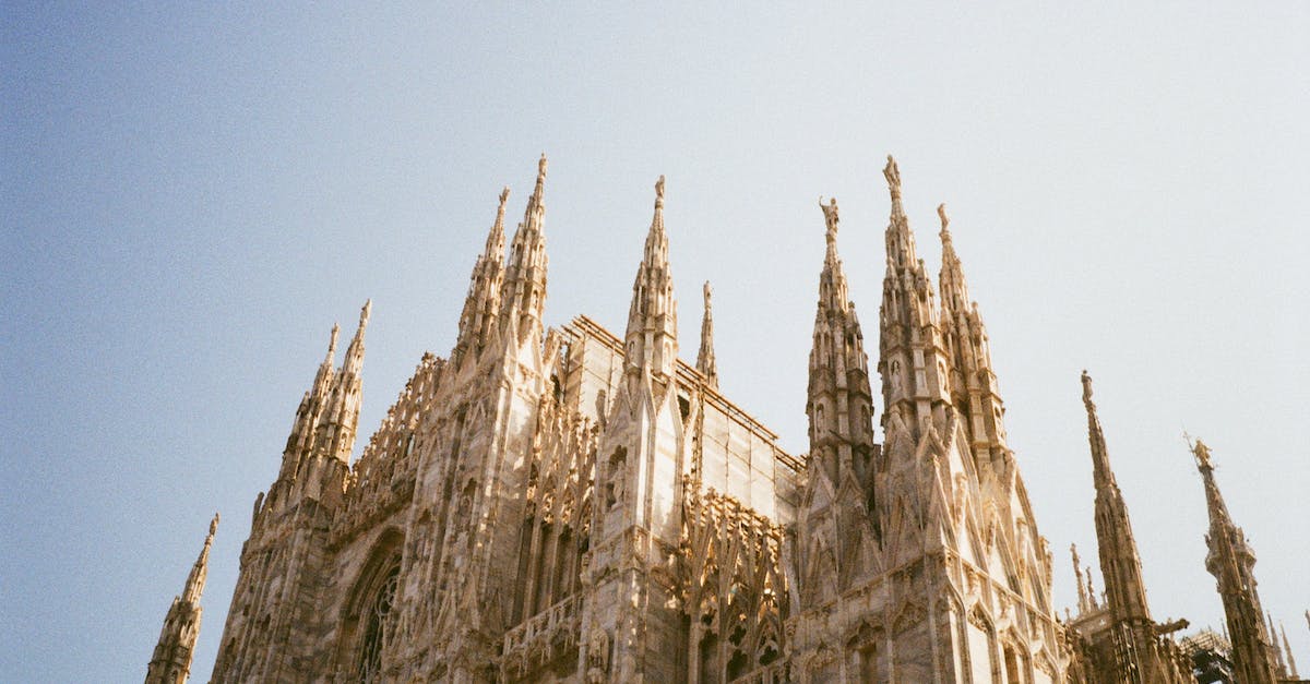 Do I need to book in advance to see attractions in Italy in October? - Brown Concrete Building Under Blue Sky Do I need to book in advance to see attractions in Italy in October? - Brown Concrete Building Under Blue Sky