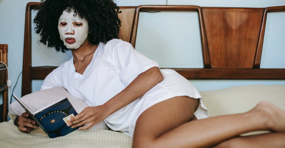Do I need to book some intra-Europe tickets to apply for Schengen visa? - Young ethnic female in white t shirt relaxing on bed and reading book while doing facial routine with cosmetic sheet mask on face Do I need to book some intra-Europe tickets to apply for Schengen visa? - Young ethnic female in white t shirt relaxing on bed and reading book while doing facial routine with cosmetic sheet mask on face