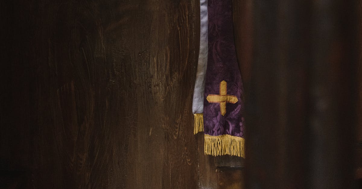 Do I need to cross immigration to collect my baggage at FCO [duplicate] - Purple and Gold Textile on Brown Wooden Table