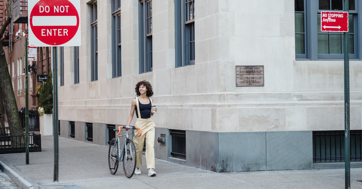 Do I need to show proof of funds? If yes, how exactly? - Contemplative ethnic woman with coffee and bike walking on pavement Do I need to show proof of funds? If yes, how exactly? - Contemplative ethnic woman with coffee and bike walking on pavement