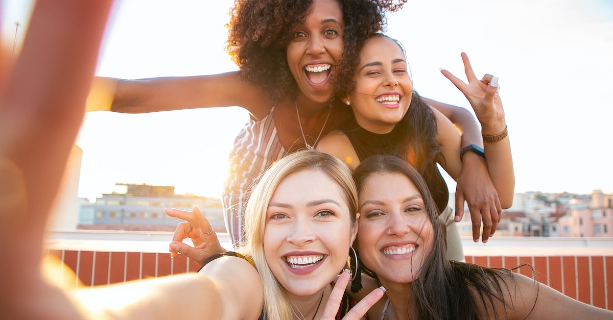Do I really have to register with the police when staying with a friend in Croatia? - Cheerful young diverse women showing V sign while taking selfie on rooftop Do I really have to register with the police when staying with a friend in Croatia? - Cheerful young diverse women showing V sign while taking selfie on rooftop