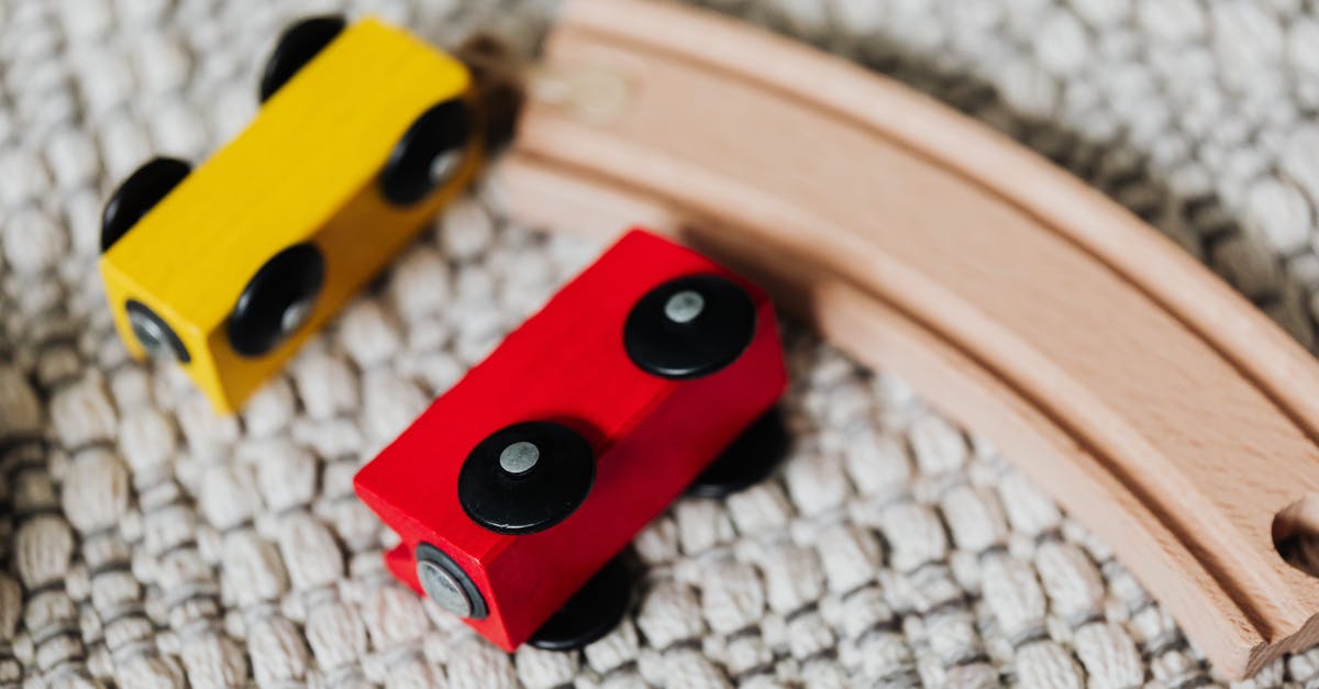 Do I require a visa and yellow fever certificate for a transit in Luanda? [closed] - Yellow and Black Plastic Toy