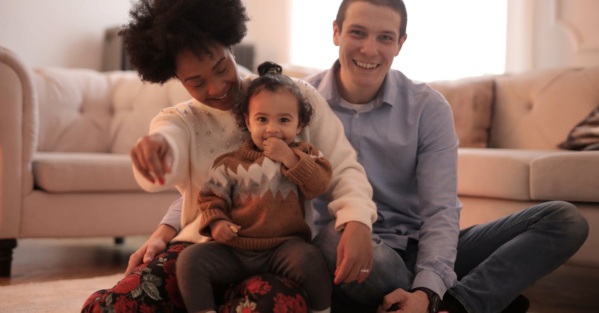 Do infant seats in the EU have a "suitable for aircraft" label on them? - Man and Woman Having Fun With Their Child Do infant seats in the EU have a "suitable for aircraft" label on them? - Man and Woman Having Fun With Their Child