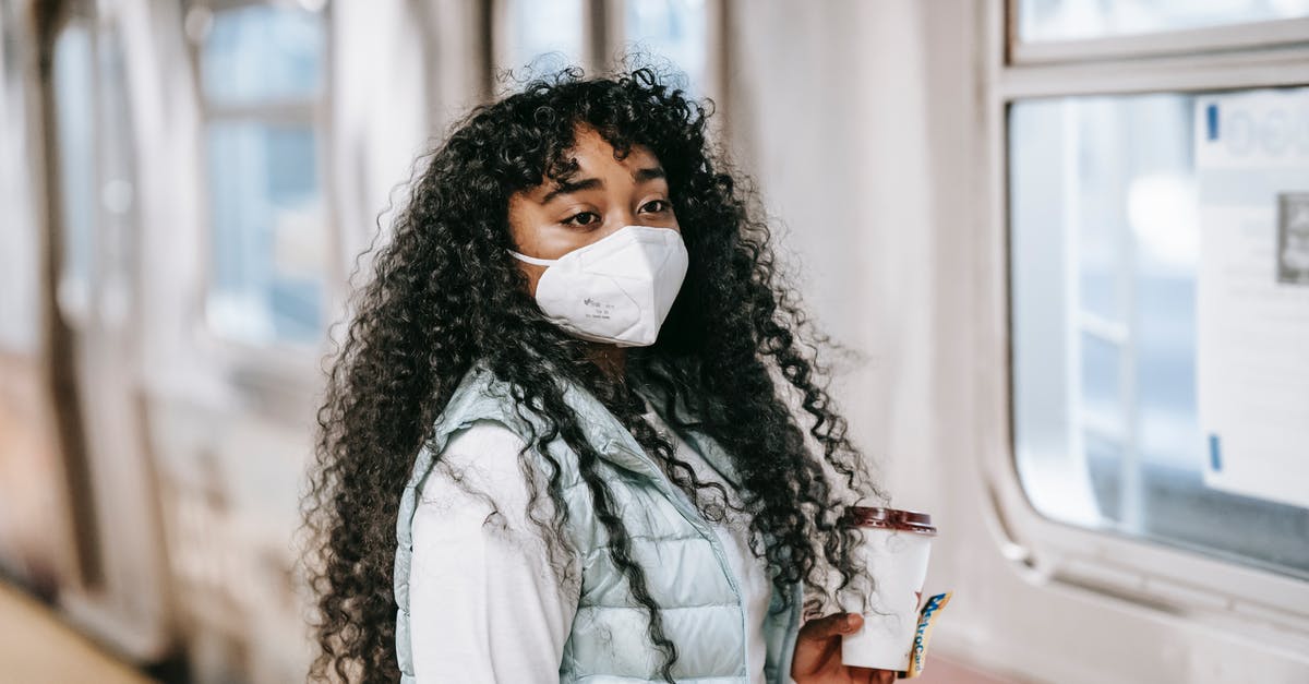 Do Kenya citizens need a transit visa for Egypt? - Black woman in mask waiting to enter subway train Do Kenya citizens need a transit visa for Egypt? - Black woman in mask waiting to enter subway train