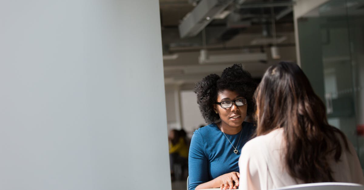 Do many Japanese people speak Korean? - Woman Wearing Blue Top Beside Table Do many Japanese people speak Korean? - Woman Wearing Blue Top Beside Table