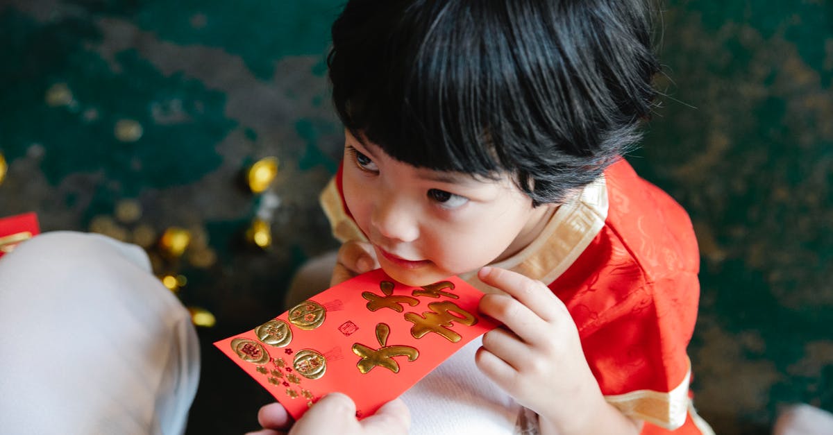Do NY Metrocards with money ever expire? - Crop mother giving hongbao red packet to son during New Year party Do NY Metrocards with money ever expire? - Crop mother giving hongbao red packet to son during New Year party