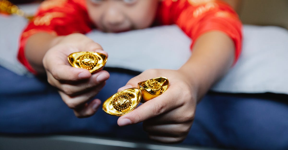 Do NY Metrocards with money ever expire? - Crop happy little Asian boy lying on bed and demonstrating traditional sycee gold ingots during celebration of Chinese New Year Do NY Metrocards with money ever expire? - Crop happy little Asian boy lying on bed and demonstrating traditional sycee gold ingots during celebration of Chinese New Year