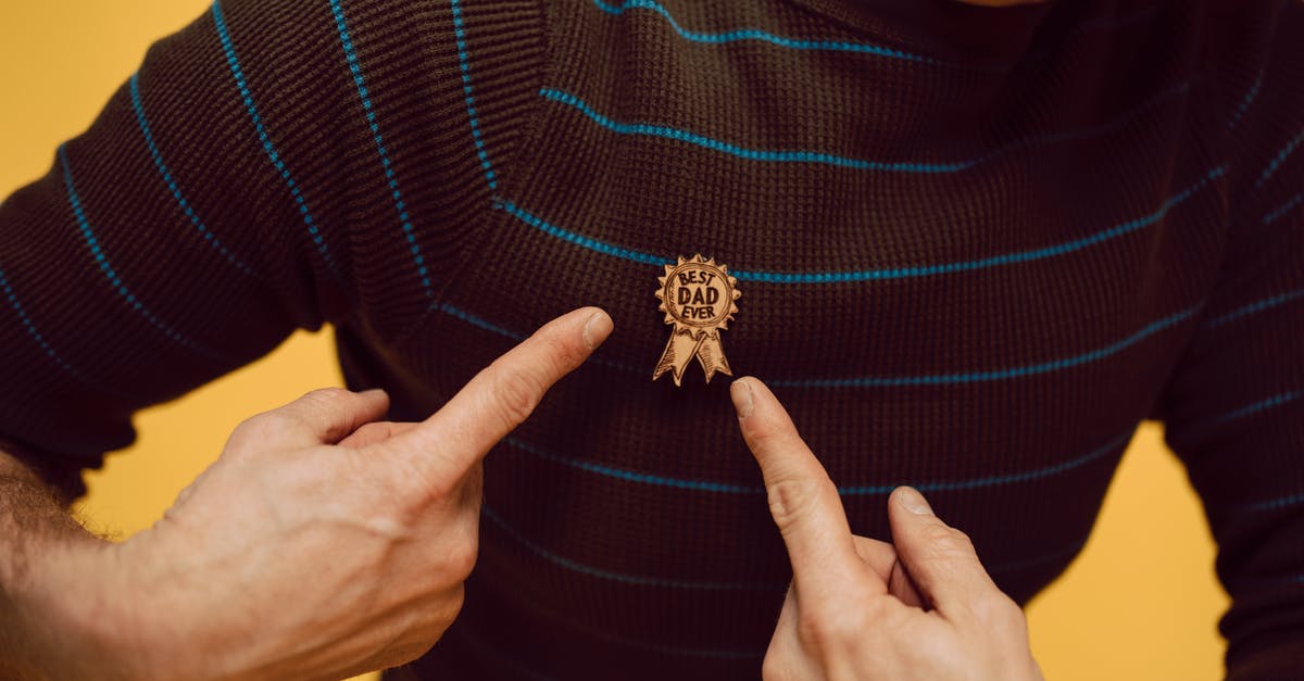 Do "last-minute" upgrades qualify for airline reward points? - A Man Pointing a Best Dad Ever Pin Do "last-minute" upgrades qualify for airline reward points? - A Man Pointing a Best Dad Ever Pin